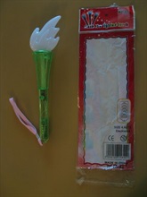 A battery-operated flash light stick, purchased at a shop in Tsuen Wan, was found to have low risk. In a drop test, the metal wires of LED (Light Emitting Diode) of the flash light stick were exposed and became accessible, making the product fail in the safety requirements of not containing "sharp points".<br />The same sample also did not comply with the requirements relating to "small parts" as its button cell batteries fell off from the product in the drop test, posing choking hazard to children.<br />Besides, the retailer failed to provide its name and address on the toy when the product was supplied to local customers.<br />Photo shows the product and its package (back).