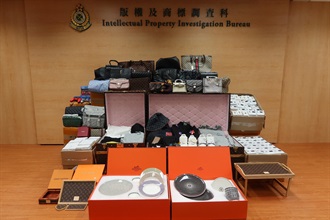 Hong Kong Customs conducted a one-month joint operation with Mainland and Macao Customs from November 17 to December 16 to combat cross-boundary counterfeiting activities among the three places and with goods destined for overseas countries. During the operation, Hong Kong Customs seized about 24 000 items of suspected counterfeit goods with an estimated market value of about $1.8 million. Photo shows some of the suspected counterfeit goods seized.