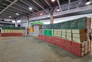 Hong Kong Customs on May 4 and 5 seized a total of about 27 million suspected illicit cigarettes with an estimated market value of about $74 million and a duty potential of about $51 million in two cases in Yuen Long and the Kwai Chung Customhouse Cargo Examination Compound respectively. Photo shows some of the suspected illicit cigarettes seized.