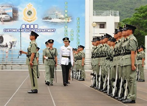Deputy Commissioner of Customs and Excise, Mr Lawrence Wong, inspects a contingent of 113 Customs Officers at the Passing-out and Deputy Commissioner's Farewell Parade at the Customs and Excise Training School today (May 30).