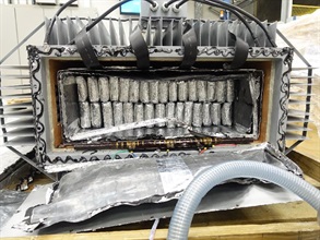 Hong Kong Customs seized about 145 kilograms of suspected cocaine and about 20kg of suspected methamphetamine with a total estimated market value of about $164 million at Hong Kong International Airport on November 18 and 19. Photo shows a large electric transformer with suspected cocaine concealed inside the false compartment.