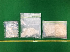 Hong Kong Customs yesterday (December 22) seized about 1 kilogram of suspected ketamine, about 230 grams of suspected cocaine and about 30g of suspected crack cocaine with a total estimated market value of about $1 million in Sham Shui Po. Photo shows the suspected dangerous drugs seized.