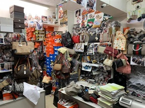 Hong Kong Customs conducted a special operation on January 27 and smashed a counterfeiting syndicate in Sham Shui Po. An upstairs showroom-cum-storage area and two storage facilities of suspected counterfeit goods were raided. A total of about 18 000 suspected counterfeit goods including handbags, wallets and shoes with an estimated market value of over $11 million were seized. Photo shows some of the suspected counterfeit goods seized.
