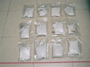 Customs officers yesterday (March 5) arrested a male and a female. A total of 3,030 grams of ketamine and small amounts of other dangerous drugs were seized, with an estimated street value of $390,000.