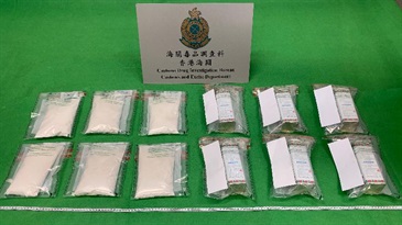 Hong Kong Customs on November 9 seized about 2.2 kilograms of suspected heroin with an estimated market value of about $3.5 million at Hong Kong International Airport. Photo shows the suspected heroin seized and the body powder tin cans used to conceal the dangerous drugs.
