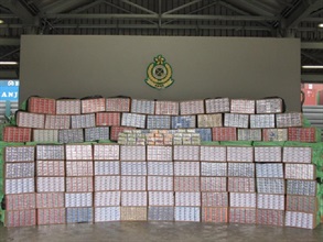Hong Kong Customs yesterday (April 29) smashed an illicit cigarette and tobacco transshipment smuggling case at Kwai Chung Customshouse Cargo Examination Compound, resulting in the seizure of about 9.3 million sticks of illicit cigarettes and 90 kilogrammes of illicit tobacco.