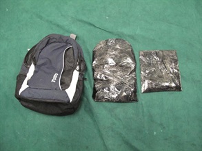 Cocaine concealed in the false compartment of rucksack.