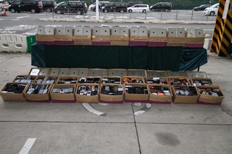 The unmanifested tablet computers and used smartphones seized in the operation.