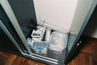 Crack cocaine and packaging paraphernalia seized at a residential flat in Tsuen Wan.