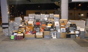 Hong Kong Customs seized about 3 200 suspected counterfeit goods with an estimated market value of about $520,000 from an incoming truck at the Hong Kong Port of the Hong Kong-Zhuhai-Macao Bridge on March 16.