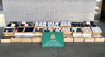 Hong Kong Customs seized about 12 000 items of suspected counterfeit goods with an estimated market value of about $17 million at Shenzhen Bay Control Point and in Lai Chi Kok on October 30 and November 1 respectively. Photo shows some of the suspected counterfeit sports shoes and mobile phones seized by Customs officers at Shenzhen Bay Control Point.