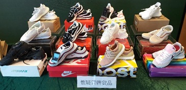 Hong Kong Customs seized about 1 100 items of suspected counterfeit sports footwear and children's clothing with an estimated market value of about $800,000 at Shenzhen Bay Control Point, in Tsuen Wan and in Tsing Yi from October 28 to November 1. Photo shows some of the suspected counterfeit sports shoes seized.
