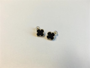 Hong Kong Customs today (September 19) seized a batch of jewellery bearing suspected false trade descriptions, including 59 pairs of earrings and 29 necklaces valued at around $56,000, at a jewellery fair held at the Hong Kong Convention and Exhibition Centre. Photo shows a pair of earrings seized.