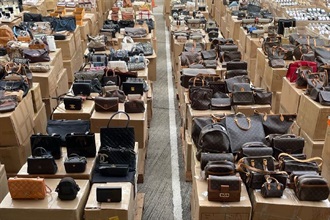 Hong Kong Customs detected a suspected smuggling case by a river trade vessel in the eastern waters of Hong Kong on October 14. A batch of suspected smuggled goods with an estimated market value of about $1.2 billion was seized, including expensive food ingredients, electronic goods, high-value goods and scheduled endangered species. This is the largest smuggling case detected by Hong Kong Customs on record in terms of the seizure value. Photo shows some of the suspected smuggled luxury handbags seized.