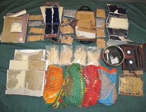 Heroin concealed in the assorted items found inside the arrestee's suitcase.
