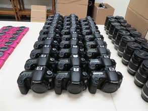 Some cameras and lens seized by the Customs in the operation.