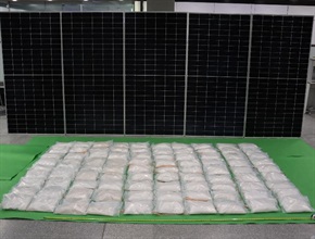 Hong Kong Customs seized about 180 kilograms of suspected methamphetamine and about 14kg of suspected heroin with a total estimated market value of about $140 million at Hong Kong International Airport, at Lok Ma Chau Control Point and in Tsuen Wan on October 5 and yesterday (October 7). Photo shows the suspected methamphetamine seized and the solar panels used to conceal the drugs.