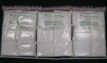Hong Kong Customs seized about 180 kilograms of suspected methamphetamine and about 14kg of suspected heroin with a total estimated market value of about $140 million at Hong Kong International Airport, at Lok Ma Chau Control Point and in Tsuen Wan on October 5 and yesterday (October 7). Photo shows the suspected heroin seized.