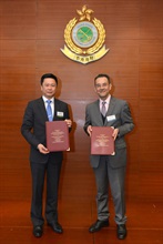 The Assistant Commissioner of Customs and Excise (Excise and Strategic Support), Mr Jimmy Tam (left), and the Deputy Consul-General of Mexico in Hong Kong and Macao, Mr Saúl Zambrano Barajas, exchange the Mutual Recognition Arrangement Action Plan at the Hong Kong Authorized Economic Operator certificate presentation ceremony today (January 13).