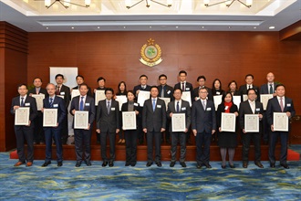 The Assistant Commissioner of Customs and Excise (Excise and Strategic Support), Mr Jimmy Tam (front row, centre), is pictured with representatives of the Hong Kong Authorized Economic Operators at the Hong Kong Authorized Economic Operator certificate presentation ceremony today (January 13).
