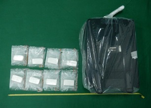 Hong Kong Customs yesterday (February 25) seized about 5 kilograms of suspected cannabis buds and 1.4 kilograms of suspected cocaine with an estimated market value of about $2.4 million in total at Shenzhen Bay Control Point and Hong Kong International Airport respectively. Photo shows suspected cocaine seized at Hong Kong International Airport.