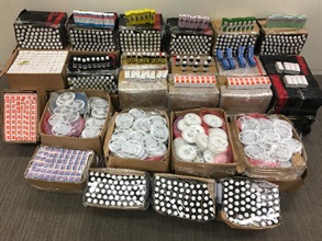 Hong Kong Customs and the Marine Police conducted a joint operation today (March 3) at Tsing Lung Tau Ferry Pier in Sham Tseng and Tsuen Wan and seized about 8 500 bottles of suspected smuggled cough syrup and five million of suspected smuggled integrated circuits with an estimated market value of about $5.7 million.