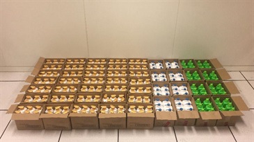 Hong Kong Customs seized more than 3 200 bottles of suspected counterfeit shampoos with an estimated market value of about $138,000 during an operation conducted between March 17 and 21. Photo shows some of the suspected counterfeit shampoos seized.