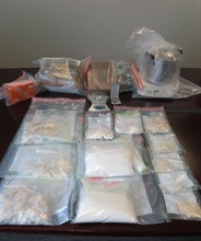 Seized cocaine and some drug-manufacturing apparatus.