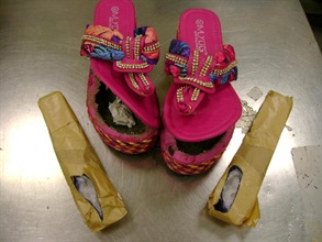 Customs officers seized methamphetamine from speedpost parcels heading to Australia last week. Photo shows the shoes for concealing the drugs.