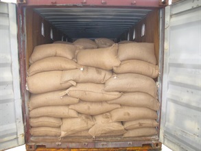 A container loaded with bags of soya.