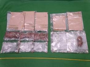 Hong Kong Customs yesterday (October 10) seized about 10 kilograms of suspected ketamine with an estimated market value of about $3.08 million at Hong Kong International Airport. Photo shows the wrapping materials used by the arrested men to strap on the suspected dangerous drugs.