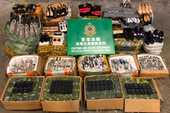 Hong Kong Customs seized about 2 000 items of suspected counterfeit goods with an estimated market value of about $480,000 at Man Kam To Control Point on June 27.