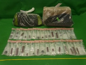 Hong Kong Customs seized about 6.7 kilograms of suspected cocaine at Hong Kong International Airport on October 21 and 23 with an estimated market value of about $5.96 million. About 1.5kg of suspected cocaine was found in the metal frame and wheels of two pieces of check-in baggage.