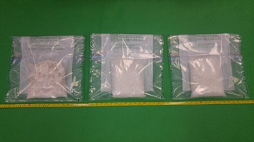 Hong Kong Customs yesterday (November 6) seized about 2 kilograms of suspected methamphetamine (right and centre) and about 600 grams of suspected crack cocaine with an estimated market value of about $1.6 million in Mong Kok.