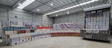 Hong Kong Customs today (September 14) in Yuen Long seized about 14 million suspected illicit cigarettes and about 900 000 electronic cigarettes suspected of containing nicotine with a total estimated market value of about $45 million and a duty potential of about $27 million. Photo shows the suspected illicit cigarettes and the electronic cigarettes suspected of containing nicotine seized.