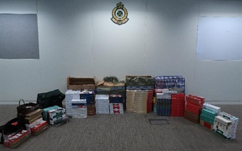 Hong Kong Customs stepped up enforcement action against illicit cigarette activities between June and July and seized about 900 000 suspected illicit cigarettes with an estimated market value of about $2.5 million and a duty potential of about $1.7 million across the territory. Photo shows the suspected illicit cigarettes seized at a storehouse in Kwun Tong.