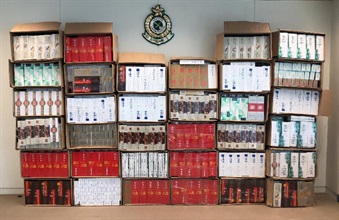 Hong Kong Customs yesterday (August 12) mounted an operation against illicit cigarette activities in Kwai Chung and Fanling and seized about 200 000 suspected illicit cigarettes with an estimated market value of about $600,000 and a duty potential of about $400,000. Photo shows the suspected illicit cigarettes seized at an industrial building unit in Kwai Chung.