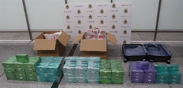Hong Kong Customs yesterday (August 22) seized about 50 000 suspected illicit heat-not-burn products with an estimated market value of about $140,000 and a duty potential of about $100,000 at Hong Kong International Airport.