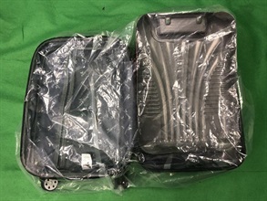 Hong Kong Customs yesterday (November 16) seized about 2 kilograms of suspected cocaine with an estimated market value of about $1.84 million from the false compartment of hand-carry baggage at Hong Kong International Airport.