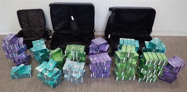 Hong Kong Customs mounted an operation codenamed "Glacier" last week, aiming to combat smuggling of illicit heat-not-burn (HNB) products. Until yesterday (August 27), Customs seized about 440 000 suspected illicit HNB products with an estimated market value of about $1.3 million and a duty potential of about $800,000. Photo shows the suspected illicit HNB products seized at a storage and distribution centre in Chek Lap Kok.