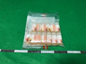 Hong Kong Customs seized products containing about 54 grams of suspected tetrahydro-cannabinol (THC) and 2.67 litres of solutions suspected of containing nicotine with an estimated market value of about $18,000 in total at Hong Kong International Airport and in Lam Tin on September 3 and yesterday (September 6) respectively. Photo shows some of the seized solutions suspected of containing nicotine.