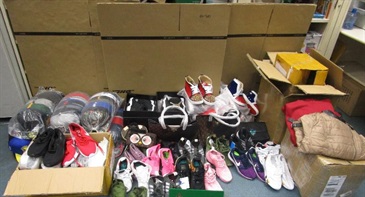 Hong Kong Customs stepped up enforcement and detected 64 cases and seized suspected dangerous drugs, counterfeit commodities and unlicensed pharmaceutical products with a total estimated market value of over $5.5 million from airmail and express cargo at the Hong Kong International Airport during the Singles' Day sales period between November 12 and 28. Photo shows some of the suspected counterfeit apparel items seized.