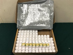 Hong Kong Customs stepped up enforcement and detected 64 cases and seized suspected dangerous drugs, counterfeit commodities and unlicensed pharmaceutical products with a total estimated market value of over $5.5 million from airmail and express cargo at the Hong Kong International Airport during the Singles' Day sales period between November 12 and 28. Photo shows some of the suspected counterfeit pharmaceutical tablets seized.