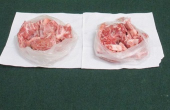 Hong Kong Customs mounted a special operation codenamed "Chameleon" in September at land boundary, rail and ferry control points to strengthen enforcement against smuggling activities making use of children. Photo shows some of the suspected smuggled pork seized.