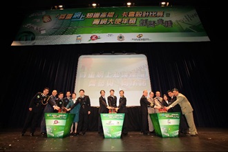 The Commissioner of Customs and Excise, Mr Richard Yuen (eighth left), the Deputy Director of Intellectual Property, Mr Peter Cheung (seventh left), the Assistant Commissioner (Intelligence and Investigation), Mr Tam Yiu-keung (seventh right), Head of Intellectual Property Investigation Bureau, Mr Albert Ho (sixth left), and representatives of 11 youth uniformed organisations officiate at the prize presentation ceremony for the "Respect IPR on the Internet" Card Holder Design Competition and "Ambassador of the Year".