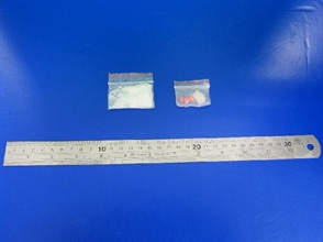 Small quantity of other drugs seized, including ketamine (left) and ecstasy (right).
