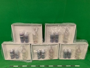 Hong Kong Customs yesterday (October 22) seized about 11 kilograms of suspected liquid cocaine and about 9 grams of suspected methamphetamine with a total estimated market value of about $11.6 million at Hong Kong International Airport. Photo shows the suspected liquid cocaine seized.