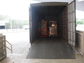 The unmanifested goods (circled) placed under manifested goods to evade detection.