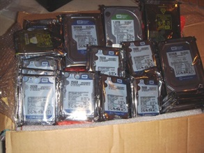 Some of the computer hard disks seized.