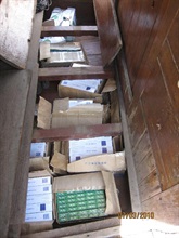 Illicit cigarettes found underneath the wooden floor inside the steering house of the vessel.